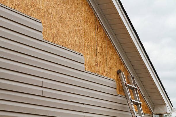 Professional Siding Installation technician working in West Chester, PA